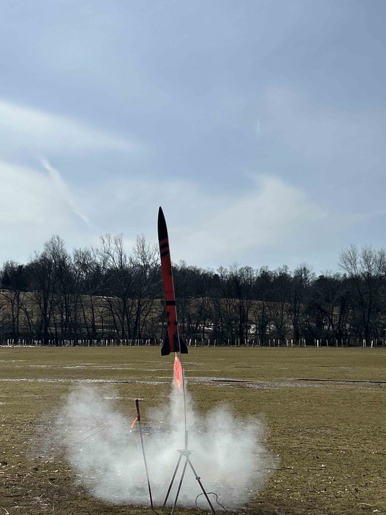 Model rocket launching.